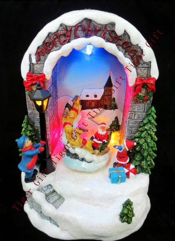 Polyresin Santa Riding Reindeer Through Gate W/LED Light and Music Box